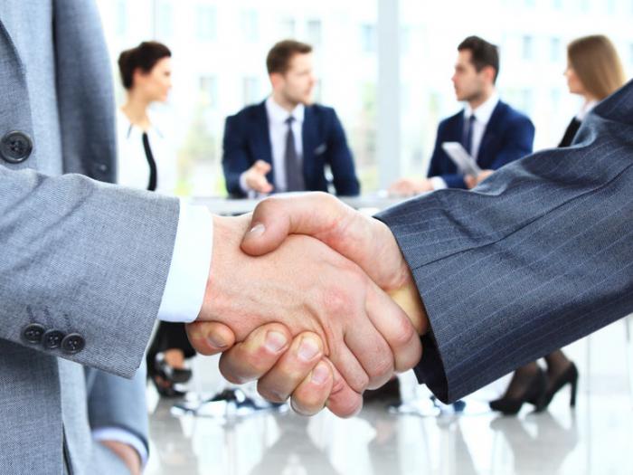 Business deal handshake